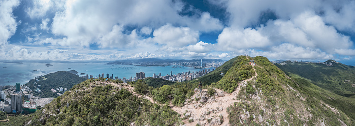 beautiful panorama of Hiker in High West, the mountain in Hong Kong Island, daytime, clear day