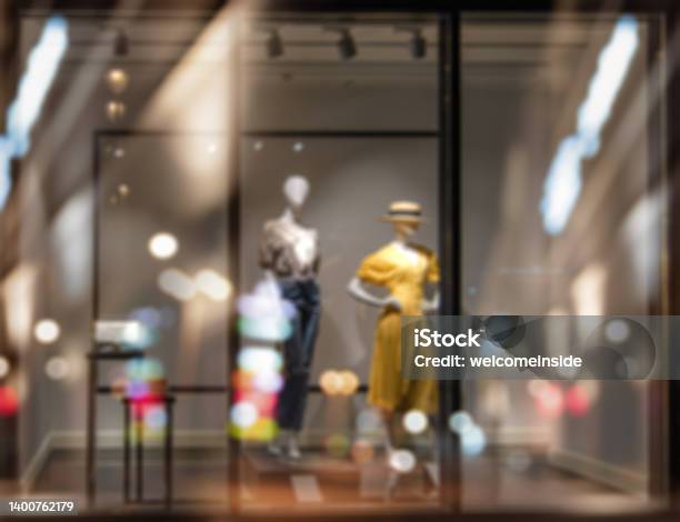 Shop Windows And Mannequins Fashion Store Exterior City Night Boutique Front View From Street Outdoor Led Light Stock Photo - Download Image Now