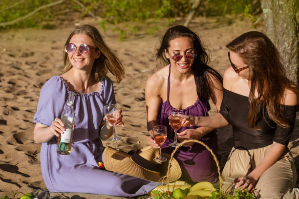 istock Friends having fun at beach on sunny day. 1400763017