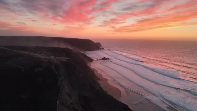 Southern Europe van trip drone clips: Praia da Cordoama, Algarve, Portugal at sunset