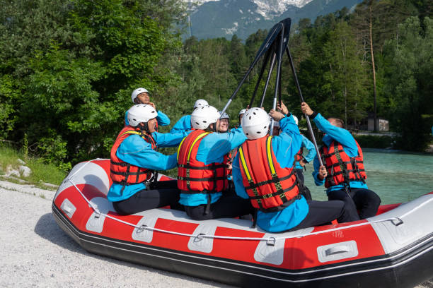 istock Group of rafter cheering and getting ready to raft 1400768509
