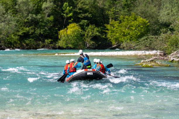 istock Whitewater rafters rowing their raft in river 1400768525