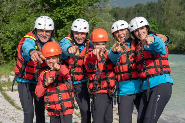 istock Group of rafter enjoying at river 1400768531