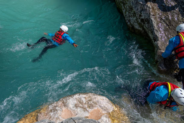 istock Friends swimming in river 1400768554