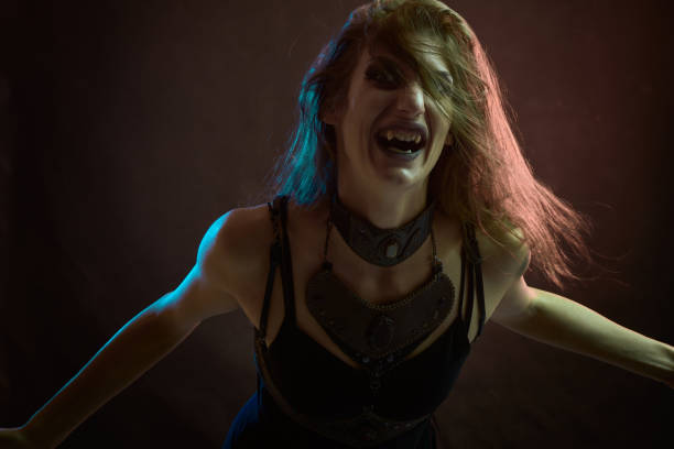 istock A young witch in agony, shouting and breaking into pieces, halloween horror 1400773809