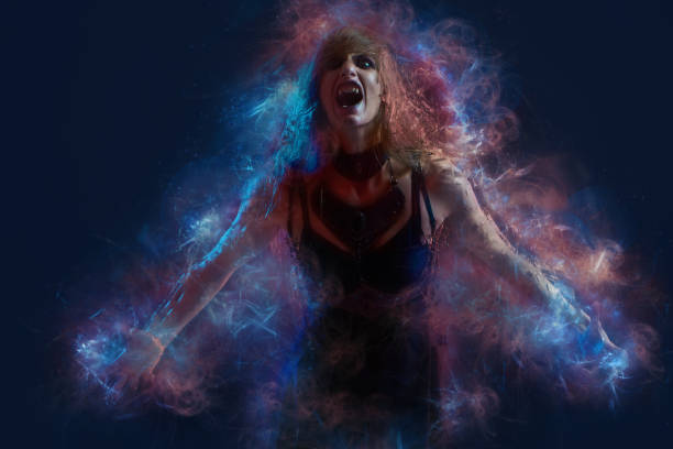 istock A young witch in agony, shouting and breaking into pieces, halloween horror 1400773816