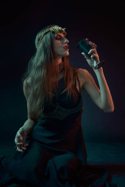 istock Dark sorceress casting a magic spell with an animal skull 1400774035