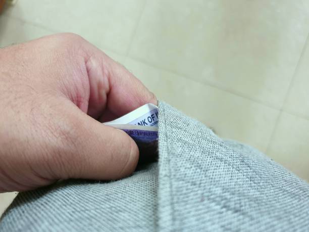 istock Put indian rupee in to paint pocket 1400774060
