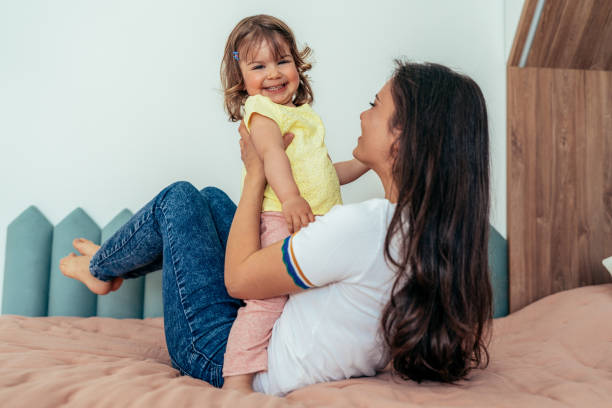 istock Mother and cute little daughter 1400774701