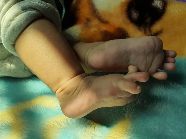 istock Foot of new born child 1400775439