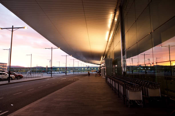 istock empty evening road in front of airport terminal 1400776657