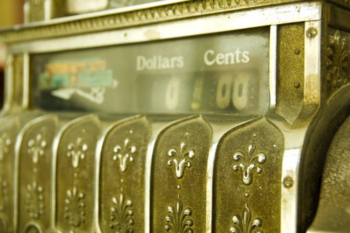 Cash register. Detail of an old cash register, charge in dollars.