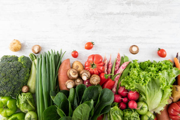 istock Fresh Vegetables on White Wooden Table 1400778368