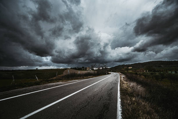 Asphalt road at stormy weather