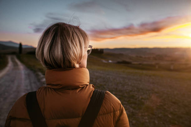 istock Watching beautiful sunset at Italian Valley -  Val d'Orcia 1400779604