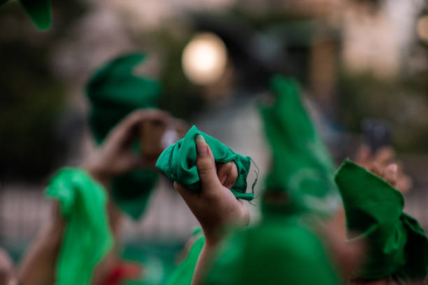 istock Hand with green symbol of pro choice 1400779752