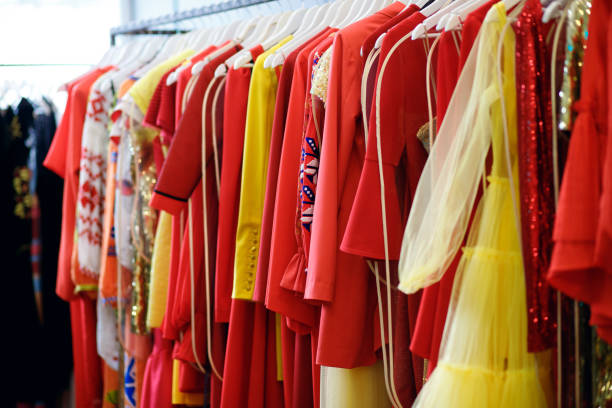 istock womens dresses on a hanger, multi-colored dresses in the trading floor 1400782597
