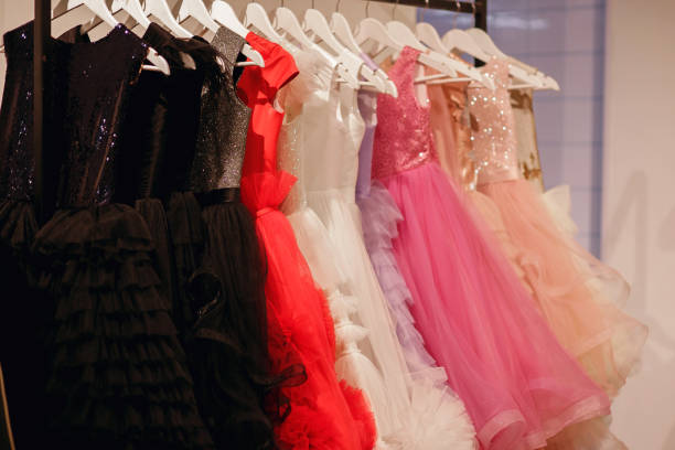 istock womens dresses on a hanger, multi-colored dresses in the trading floor 1400782822