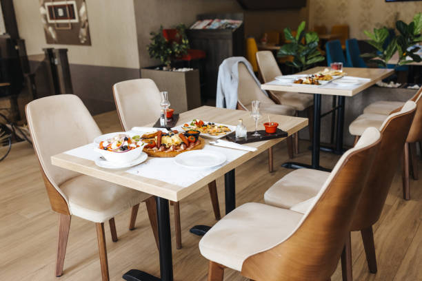 Tables setting for lunch in restaurant without people