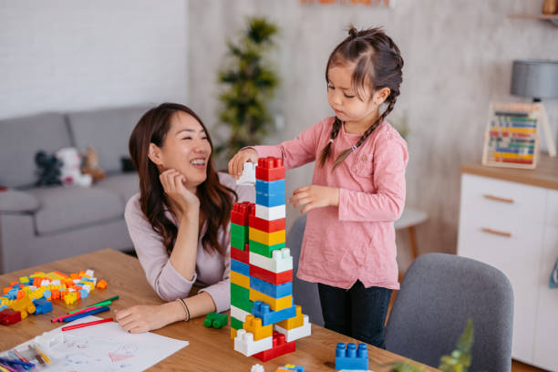 istock Mother Playing With Her Child 1400793625