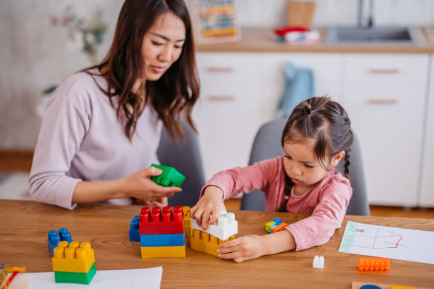 istock Mother Playing With Her Child 1400793924