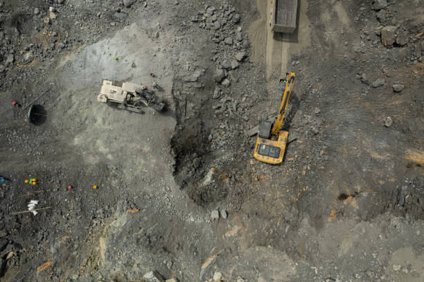 istock aerial view of excavator scooping rocks 1400794007