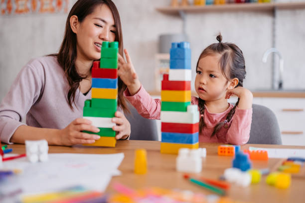 istock Mother Playing With Her Child 1400794261