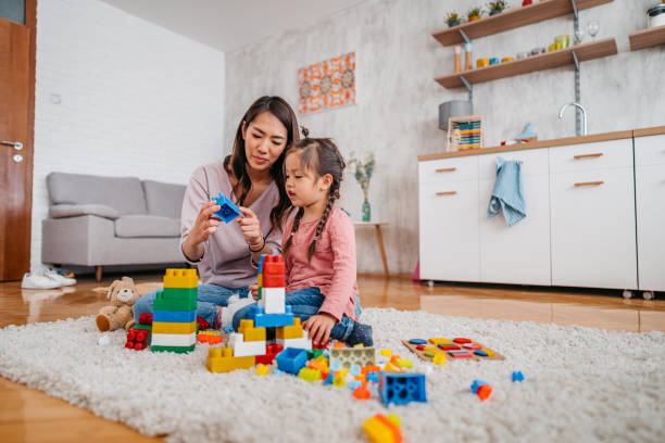 istock Mother Playing With Her Child 1400795354