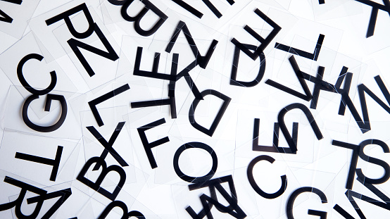 messy letters pattern on white background