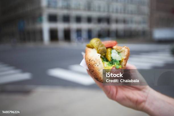 Hand Holding Hot Dog On Street Stock Photo - Download Image Now - Hot Dog, Chicago - Illinois, Food