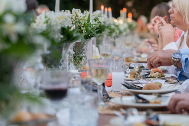 istock Luxury dinner, friends having dinner together at wedding ceremony. 1400798442