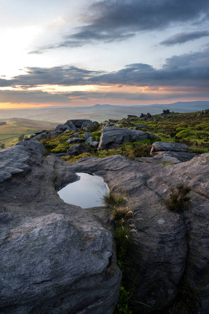 istock Panoramic view from The Roaches at sunset in the Peak District National Park. 1400799158