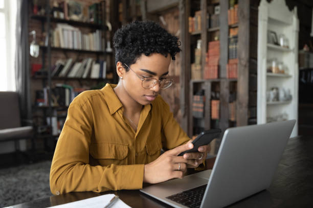 istock Focused freelance employee working at loft home office workplace 1400800088