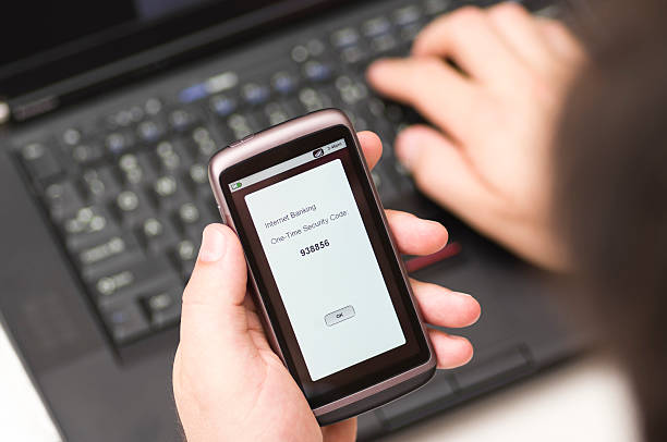 One time Security code SMS arrives on a smartphone stock photo