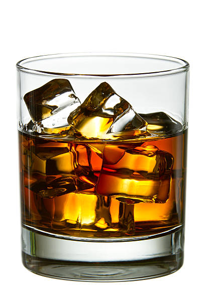 istock Whiskey with ice cubes in glass 140080254