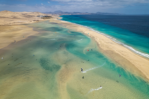 Aerial view of Kitesurfers on Playa de la Barca and Playa de Sotavento de Jandia, Fuerteventura, Canary islands, Spain