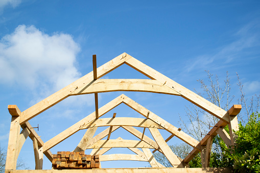 renovation of a roof - wooden beams. construction site -