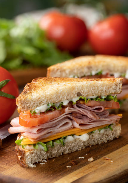 istock Ham sandwich with cheese, lettuce and tomato 1400814498