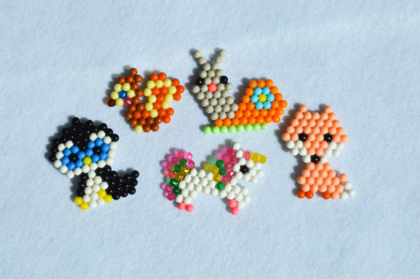 istock children's crafts. handmade work. small toys. background for the design. 1400817046