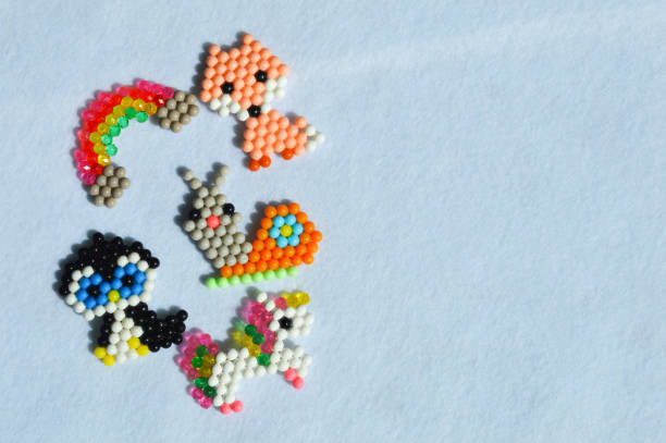 istock children's crafts. handmade work. small toys. background for the design. 1400817050