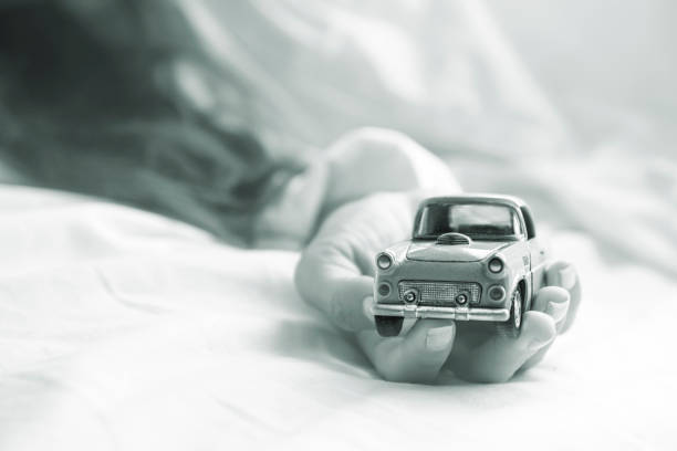 parking toy cars in a row isolated on white.