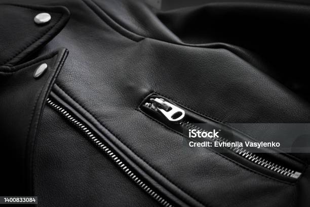 Black Leather Jacket The Texture Of The Skin In Clothing Clothing Accessories Rivets Buttons Zipper Sewing Leather Clothes Stock Photo - Download Image Now
