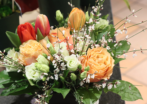 bouquet of various flowers decorated as a gift
