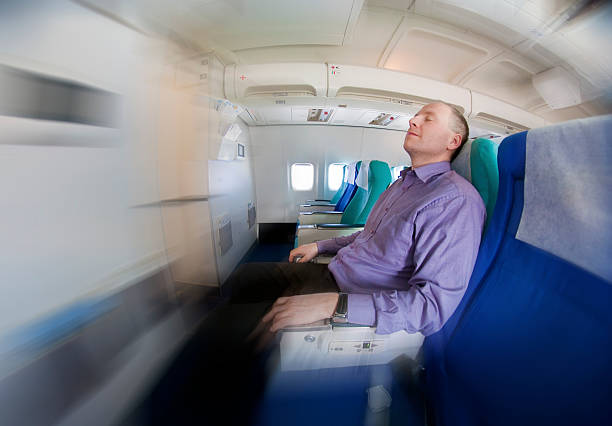 istock Businessman resting on a airplane 140083711
