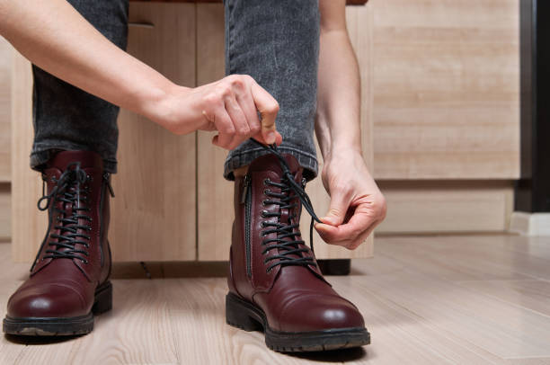istock Woman tying shoelace before to go outside 1400837241