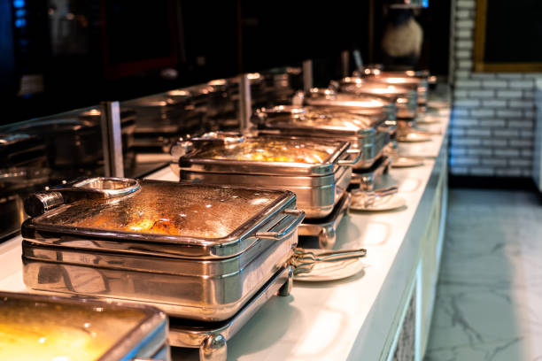 istock Many buffet heated trays ready for service in hotel restaurant 1400838322