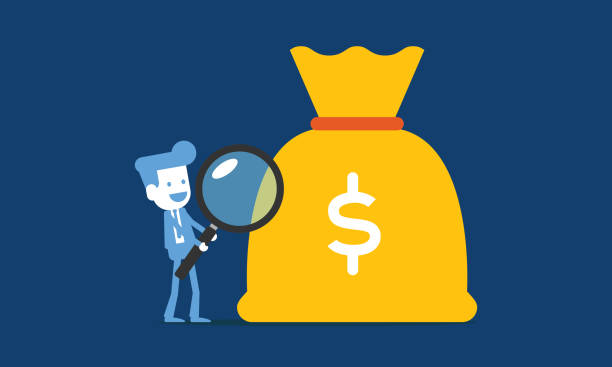 istock Businessman with magnifying glass looking for money bag 1400838781