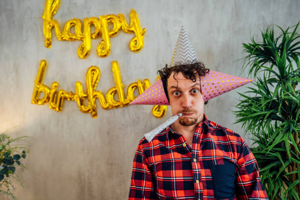 istock Funny man celebrating his birthday 1400839362