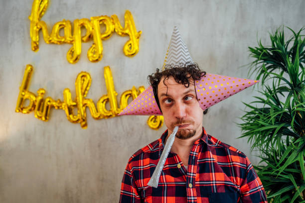 istock Funny man celebrating his birthday 1400839690