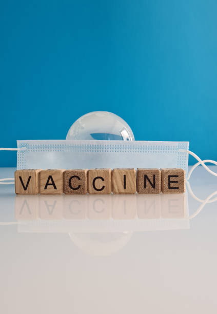 istock World vaccine protective medical mask and globe 1400840064